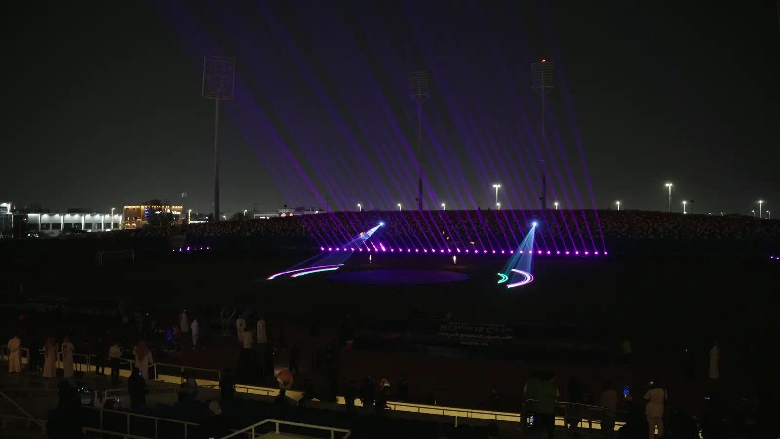 Saudi Women’s Super Cup — Violet and turquoise projections